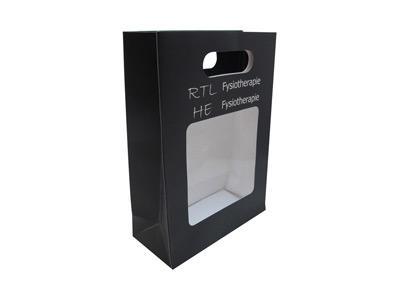 Bolsa de papel con manija troquelada